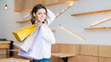 young-woman-with-paper-bags-cafe_23-2147786756.jpg