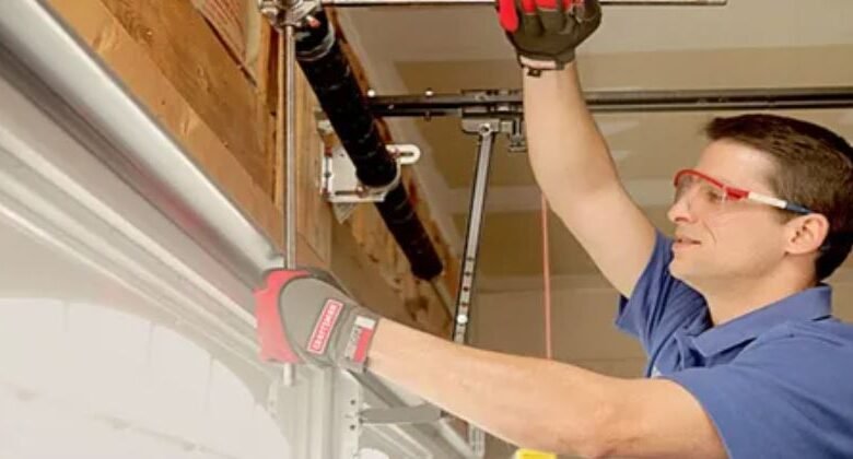 Garage door repair service in Maryland, showcasing a technician fixing a residential garage door.